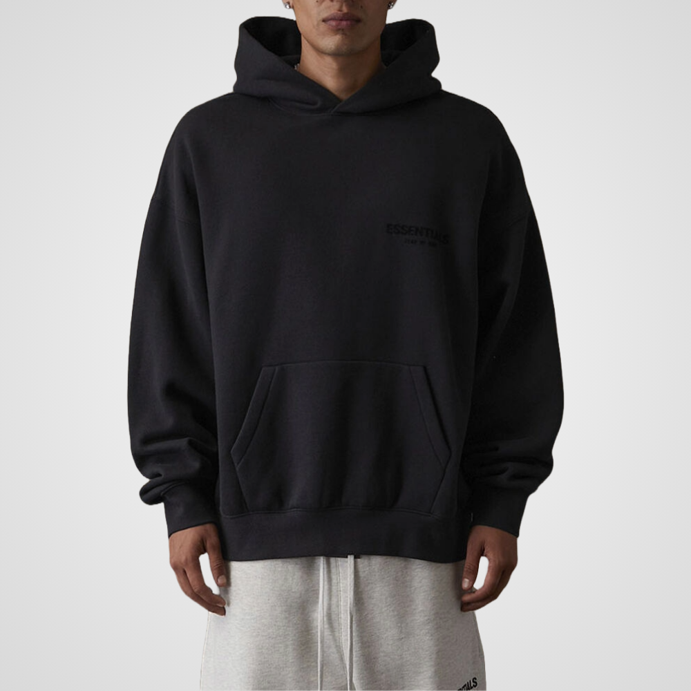Man wearing Essentials Fear of God hoodie