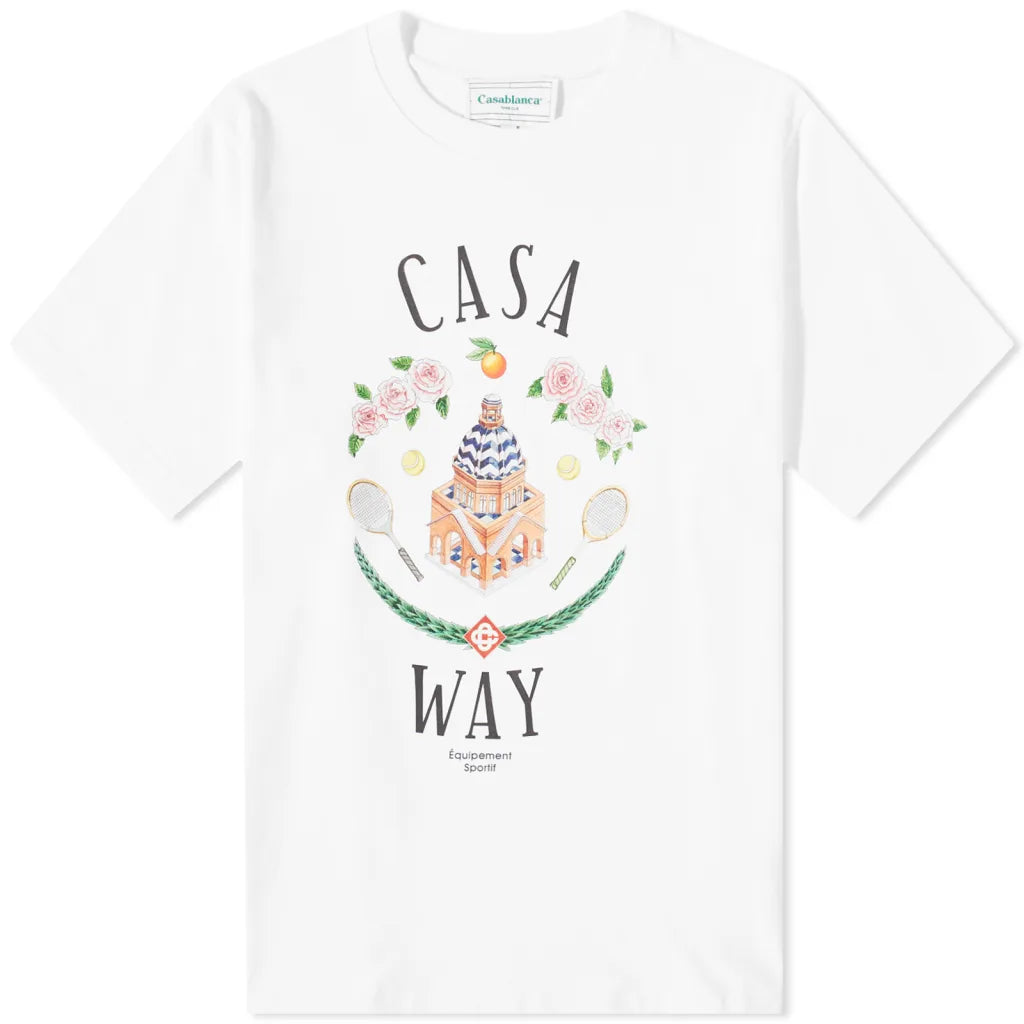 Explore the Casablanca Casa Way T-Shirt, a sporty tee made from organic cotton. This white T-shirt features a lively design depicting a building, flowers, oranges, and tennis rackets. The words "Casa Way" and "Equipment Sportif" beautifully frame the vibrant illustration.