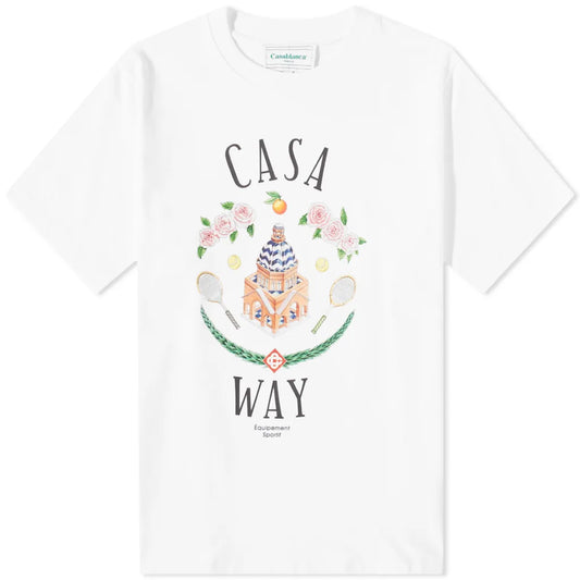 Explore the Casablanca Casa Way T-Shirt, a sporty tee made from organic cotton. This white T-shirt features a lively design depicting a building, flowers, oranges, and tennis rackets. The words "Casa Way" and "Equipment Sportif" beautifully frame the vibrant illustration.