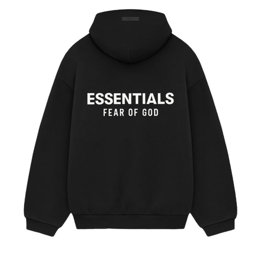 The Fear of God ESSENTIALS HOLIDAY24 Hoodie in black is a luxury streetwear item featuring "ESSENTIALS" in bold white letters and "FEAR OF GOD" on the back. It includes a drawstring hood and long sleeves for a sleek appearance.