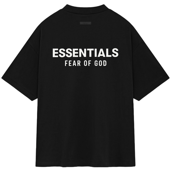 Black Fear of God ESSENTIALS HOLIDAY24 T-shirt featuring bold white "ESSENTIALS" and "FEAR OF GOD" text on the back.