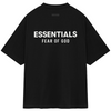 Black Fear of God ESSENTIALS HOLIDAY24 T-shirt featuring bold white "ESSENTIALS" and "FEAR OF GOD" text on the back.