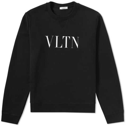 The Valentino VLTN Logo Sweatshirt, crafted in Italy, displays the VLTN branding through its black design with the iconic letters printed in white across the chest. It includes a ribbed crew neck, cuffs, and hem for a classic fit.