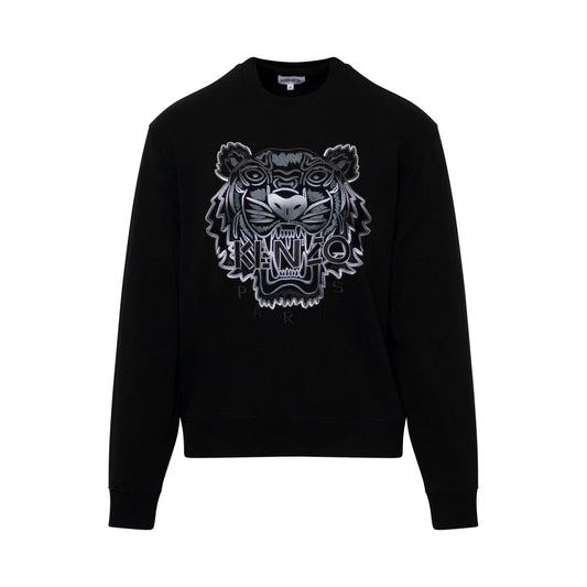 Embrace Parisian style with the Kenzo Gradient Tiger Embroidered Sweatshirt, featuring bold branding. The striking gradient tiger design on the front artistically intertwines with "KENZO," creating a chic and powerful fashion statement.