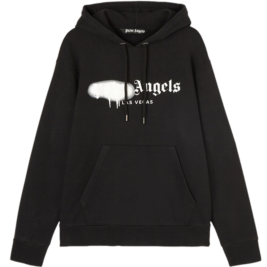 This Palm Angels Las Vegas Sprayed Logo Hoodie from the brand Palm Angels is a black hooded sweatshirt featuring a large front pocket. It showcases a distinctive sprayed logo effect with the bold print "Palm Angels Las Vegas.