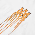 Close-up of a white background featuring an abstract orange design resembling dripping paint, forming a stylized "MM" shape, reminiscent of the graphic logo ideal for the Amiri Spray Paint Logo T-Shirt White by Amiri.
