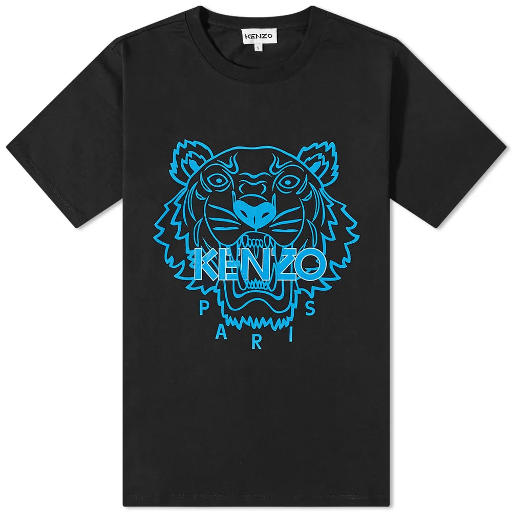 The Kenzo Neon Classic Tiger Print T-Shirt is a black, iconic piece made from premium cotton. It features a blue outline of the Kenzo tiger's face with "KENZO PARIS" seamlessly integrated into the front design. This shirt is complete with a crew neckline and short sleeves, embodying the brand's signature style.