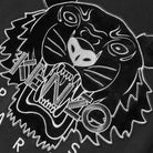A close-up view reveals the fierce roar of a black and white embroidered tiger on the Kenzo Festive Tiger Sweatshirt. Crafted from premium cotton, this piece showcases detailed stitching that accentuates the tiger's bold expression alongside the integrated "KENZO" lettering, epitomizing both luxury and artistry.