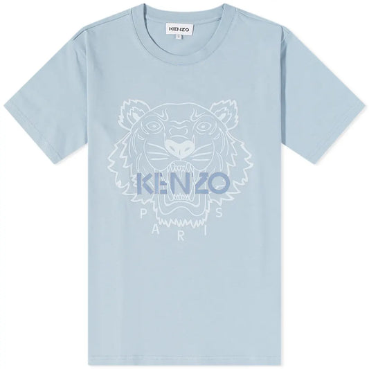 Introducing the Kenzo Classic Festive Tiger T-Shirt: a light blue Kenzo shirt adorned with their iconic tiger logo and "KENZO Paris" on the front. Made from luxurious cotton, the slightly translucent tiger design adds a stylish and contemporary touch.