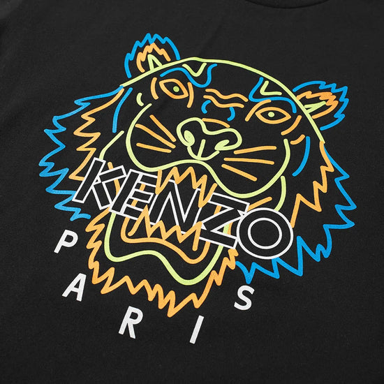The Kenzo Neon Tiger T-Shirt by Averlo is a black cotton crewneck featuring a vibrant tiger face graphic highlighted with neon shades of blue, yellow, and orange. The word "KENZO" is prominently overlaid on the tiger's face, with "PARIS" elegantly printed below in white letters. Experience the printed branding on this slim-fit masterpiece.